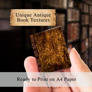 Unique royal miniature book cover held in hand, suitable for dollhouse libraries