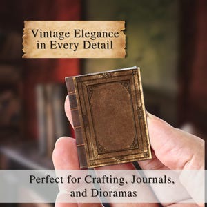 Hand holding DIY mini book with weathered texture, perfect for crafting