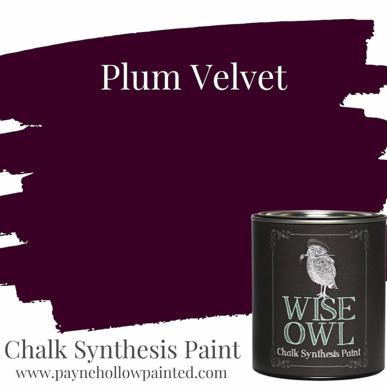 May include: A tin of Wise Owl Chalk Synthesis Paint in Plum Velvet, a deep purple hue. The black tin has a label with an owl illustration. The words "Plum Velvet" and "Chalk Synthesis Paint" are also visible.
