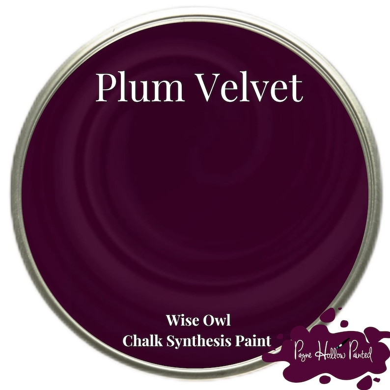 May include: A tin of Plum Velvet chalk synthesis paint by Wise Owl. The paint is a deep, rich purple colour with a metallic silver rim. The words "Plum Velvet" are printed in white across the top of the tin.