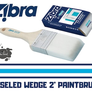 May include: A 2-inch chisel-edged paintbrush with a white bristle head and a wooden handle. The brush is labeled "Zibra" and is designed for edging, trimming, and painting flat surfaces. The packaging is also visible in the image.