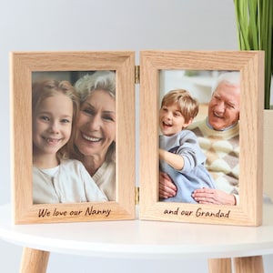 Solid oak hinged double photo frame with engraved message available with photo printing service. Ideal gift for grandparents or family to capture those special family moments together.