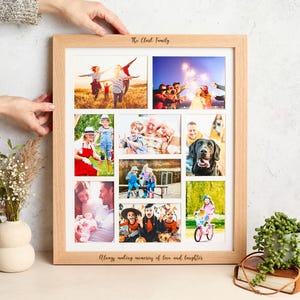 May include: A wooden multi-photo frame with nine picture slots. The frame has the text "The Clark Family" at the top and "Always making memories of love and laughter" at the bottom. The frame is held by a person.
