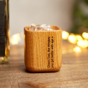 Solid oak whiskey tumbler engraved with a hidden message ' Dad you get better with age like good whiskey'