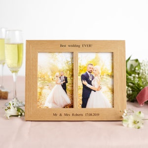 Solid oak double photo picture frame, engraved with a message of your choice. A perfect wedding gift or anniversary gift.