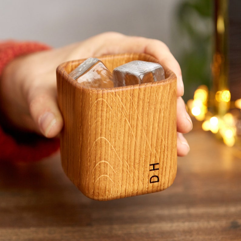 Solid oak whiskey tumbler engraved with initials, perfect for Father's Day gift with ice