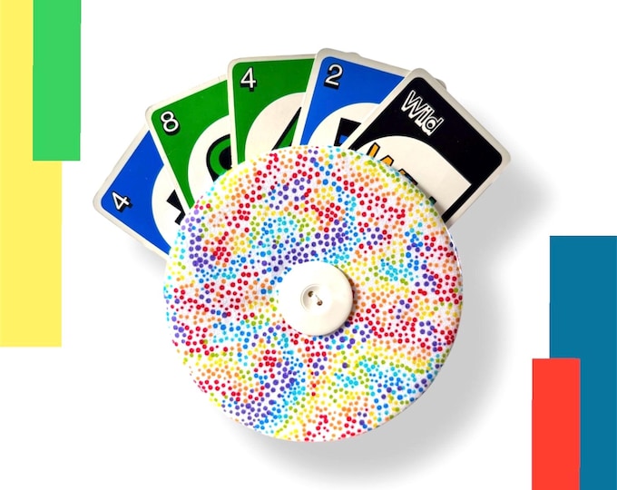 Playing Card Holder/Helper!  Young or older individuals who experience difficulty holding cards.