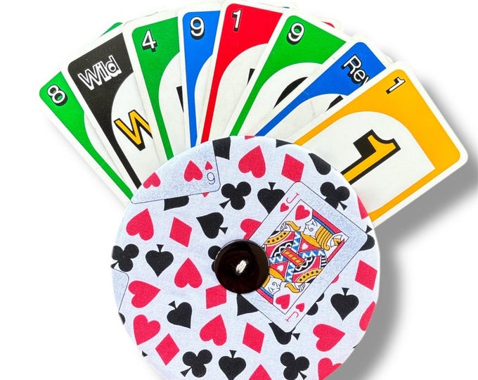 Playing Card Holder/Helper!  Young or older individuals who experience difficulty holding cards.