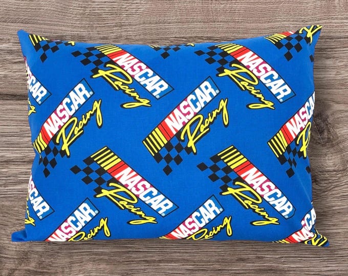 NASCAR Racing! Who needs a checkered flag when you can have a checkered pillow cover? Rev up your decor with this fun NASCAR-inspired design