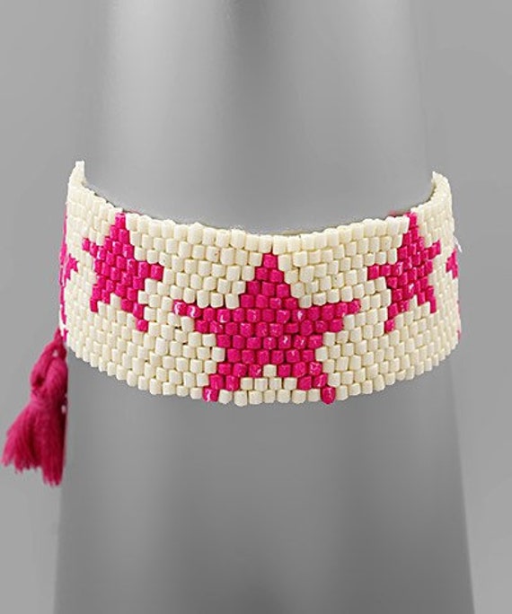 Pink and White Bracelet With Star 