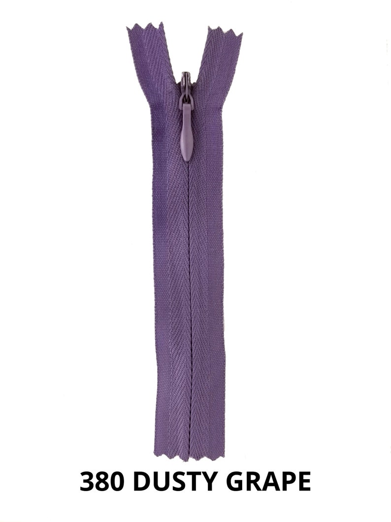May include: A purple zipper with a silver slider. The zipper is labeled "380 DUSTY GRAPE".
