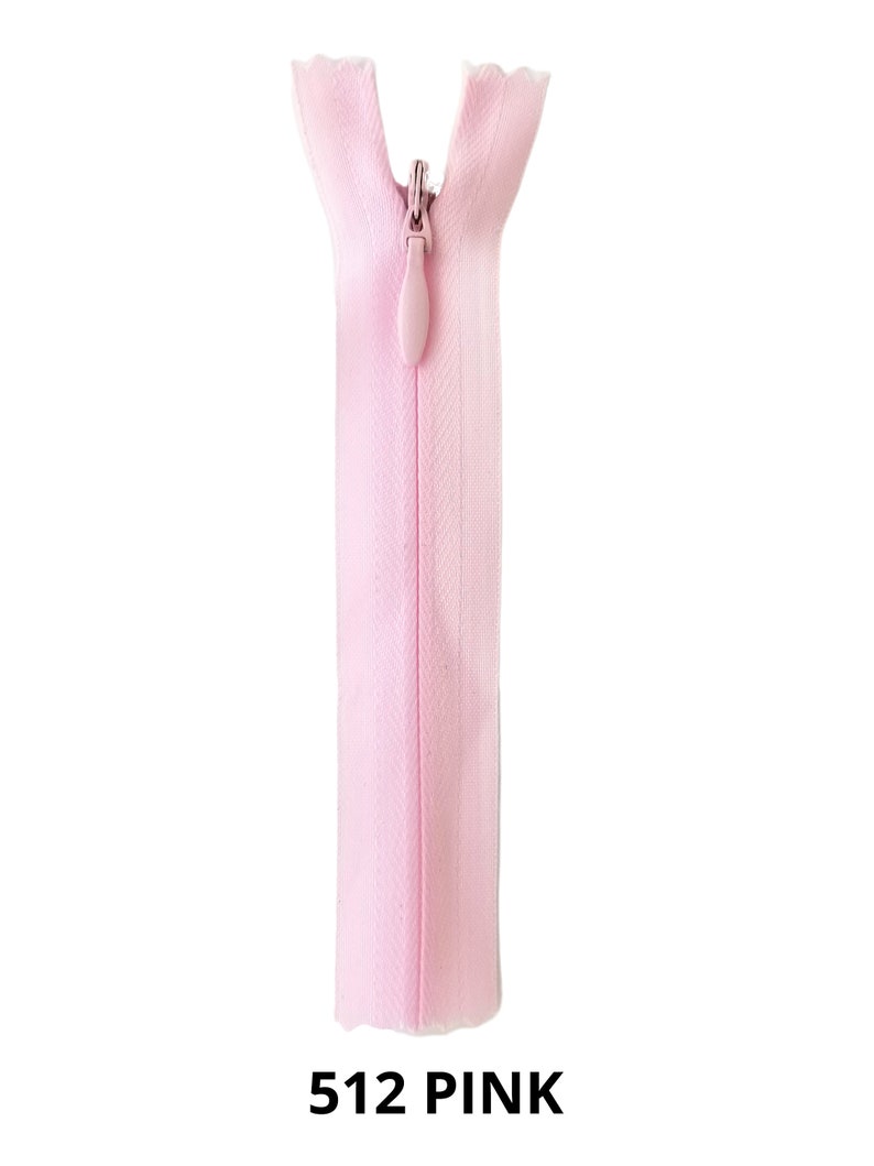 May include: A pink zipper with a plastic slider. The zipper is closed and the slider is in the up position. The zipper is labeled "512 PINK".
