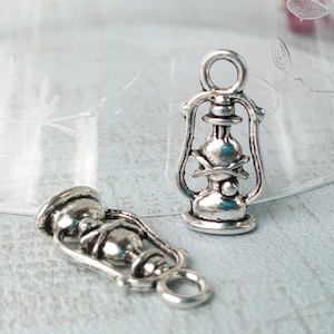 2 kerosene lamps in silver