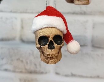 Crâne de chapeau de Père Noël, boule de crâne, crâne de Noël.