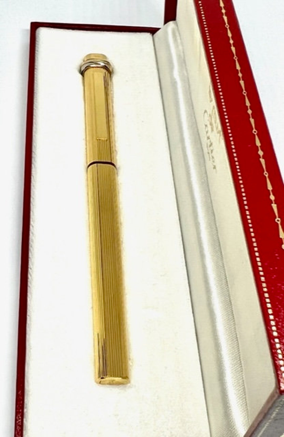 Lot - CARTIER GOLD-PLATED BALLPOINT PEN WITH OTHER GOLD FILLED PENS