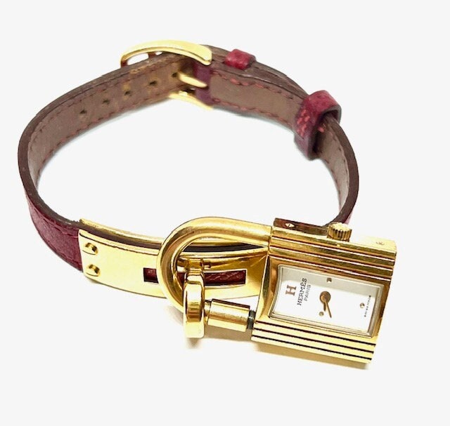 Hermès Kelly Watch – Gold-plated Case Red Strap, White Dial  display picture 1