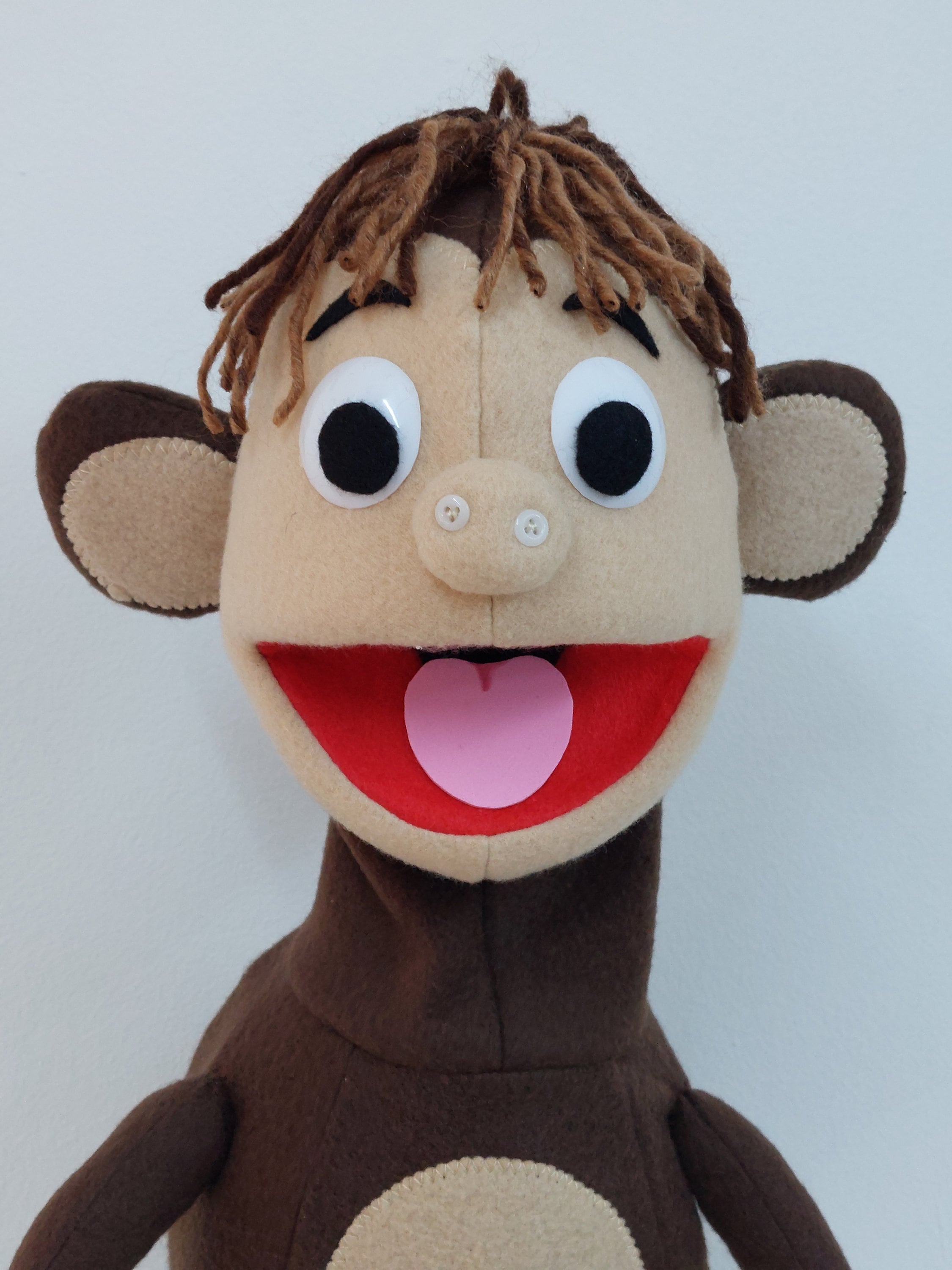 Marionnette à main de singe bourrée de bouche mobile ouverte pour
