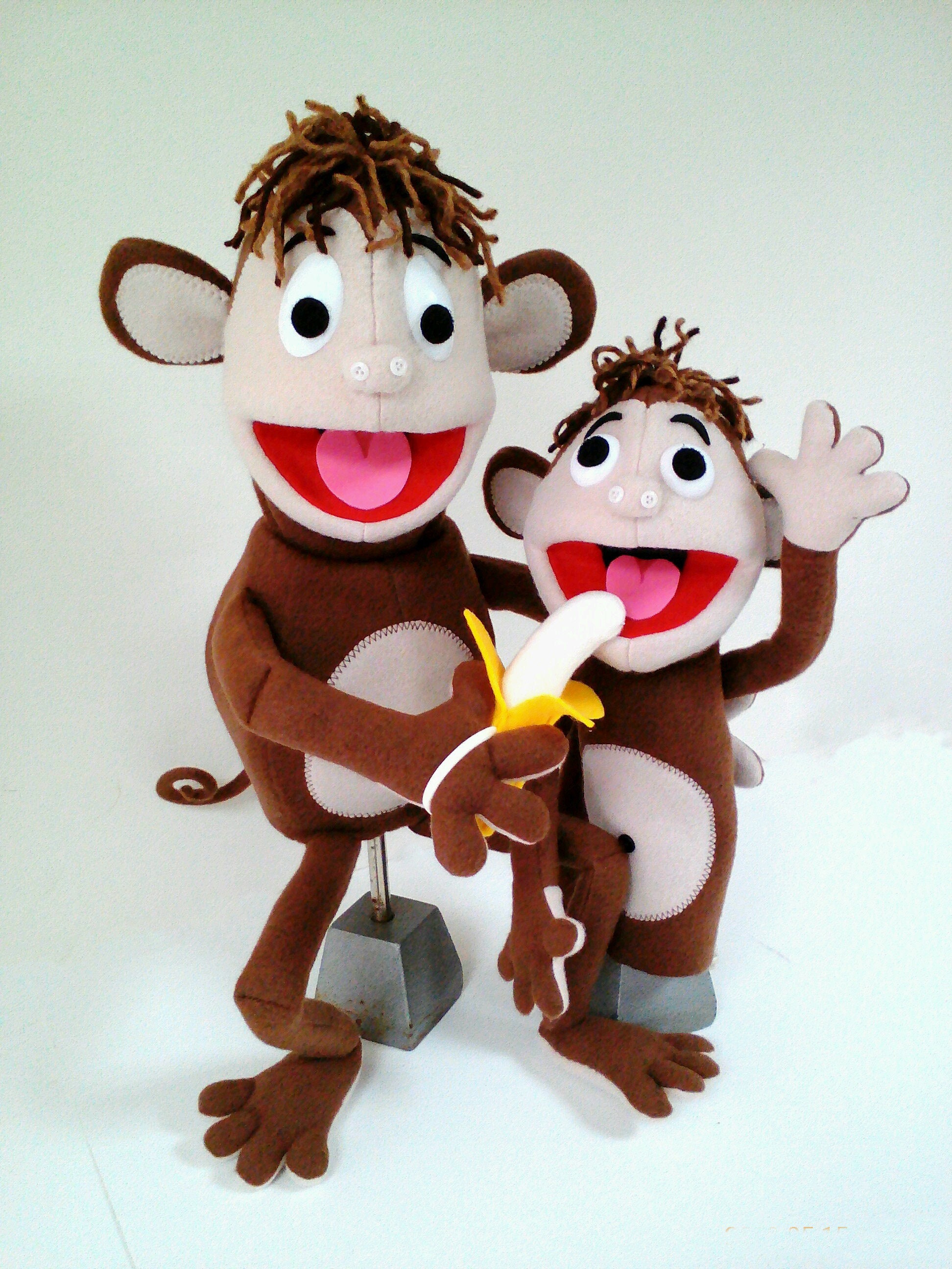 Marionnette à main de singe bourrée de bouche mobile ouverte pour