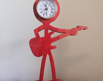 Handmade wooden guitarist clock
