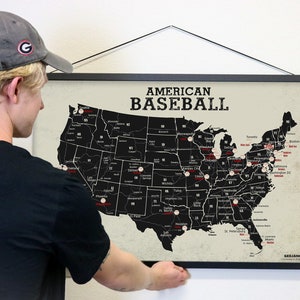 May include: A black and white map of the United States with red dots marking the locations of Major League Baseball teams. The map is titled "American Baseball".