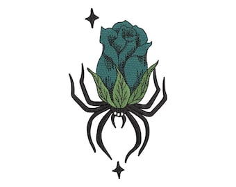 May include: Embroidered design of a teal rose bud with green leaves, atop a black spider. Two small, black star shapes are above and below the rose and spider. The design is on a white background.