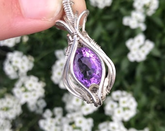 beautiful purple faceted amethyst pendant; sterling silver and handmade, chain included :)