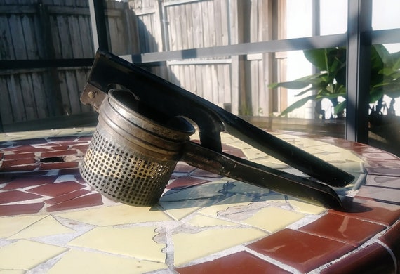 Rustic country kitchen ricer. Vintage kitchen Universal potato masher
