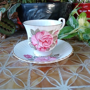 Vintage teacup, Royal Windsor fine bone china tea cup and matching saucer. Beautiful scalloped cup and saucer made in England.