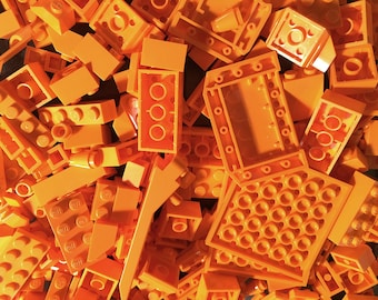 8 oz (1/2 pound) of Orange Bulk Lego