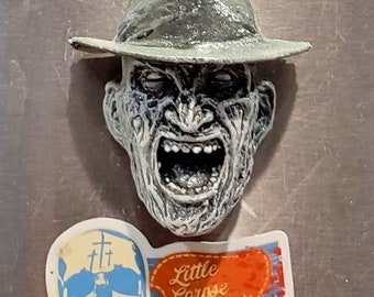 Black and white Krueger resin refrigerator magnet