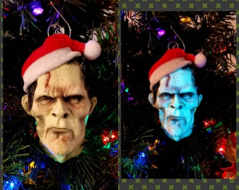Large Frankenstein inspired glow in the dark Christmas ornament with santa hat