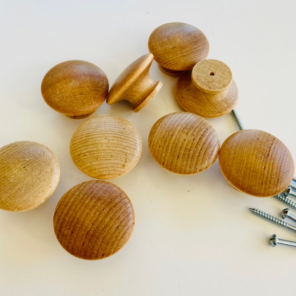 Solid wood cabinet knobs sealed in natural wood color, 1.5" diameter with 1.25” screw. 1 knob.