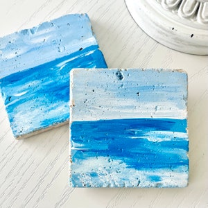 Ocean stone or ceramic coasters personalized with any beach town or name, hand painted. Set of 2
