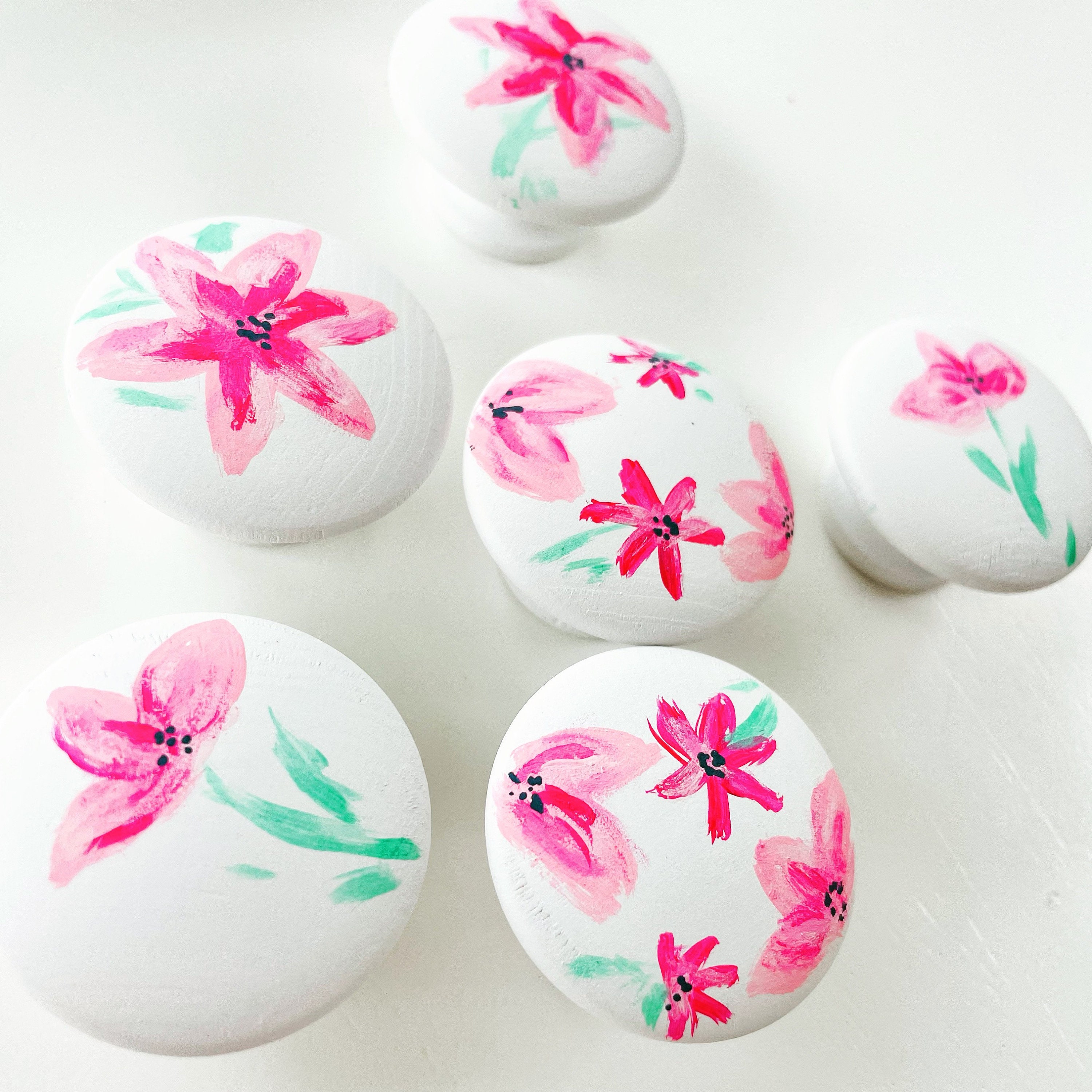Floral drawer knobs - white  wood knobs with hand painted pink blue purple abstract floral designs.  1.5 or 2".  Includes screws(1 knob)