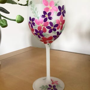 Floral hand painted wine glass