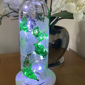 Hand painted white floral glass wine bottle light with battery operated cork LED lights