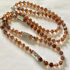 Long Dark Brown Crystal Glass Flapper Necklace: Tibetan Silver Accents