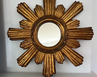 vintage Italian sunburst starburst mirror in gilt gold carved wood design