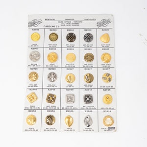 May include: A card displaying a range of gold, silver, and antique gold buttons. The card is labelled "Card No. 51" and features the company name "Sterling Buttons".