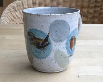 Coffee cup, tea cup with robins, wrens, goldfinches made of pottery