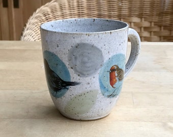 Coffee cup, tea cup with robins, blackbirds, goldfinches made of pottery