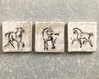 small tiles with horse motifs - pottery - in a vintage look