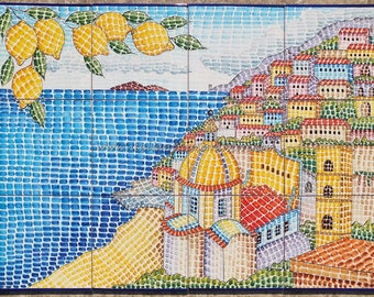 May include: A colorful ceramic tile mural depicting a seaside town with a yellow domed church, blue water, and a lemon tree with yellow lemons.