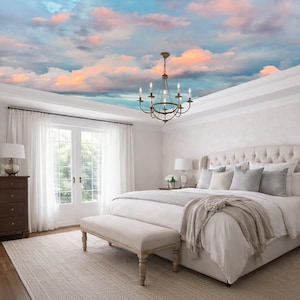 May include: A bedroom with a painted ceiling depicting a sky with clouds. The room features a large bed, a bench, a dresser, and a chandelier. The color scheme is neutral with white, beige, and brown tones.