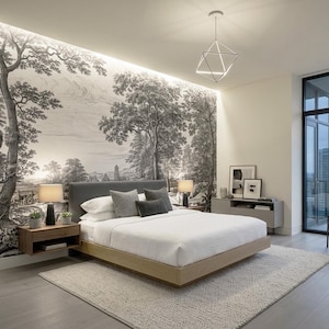 May include: A contemporary bedroom featuring a monochrome forest mural as a backdrop to a bed with a grey headboard and white bedding. A geometric light fitting hangs from the ceiling. The room has a neutral colour scheme.