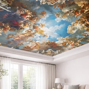 May include: A painted ceiling mural depicting a classical scene with figures, clouds, and a blue sky. The artwork is framed by a white ceiling and is above a room with white curtains and a window.