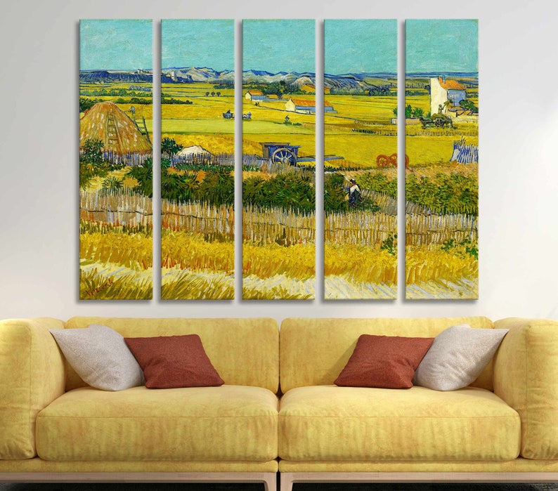 May include: A five-panel canvas print of a landscape painting. The artwork depicts a rural scene with a field of yellow wheat, a blue sky, and a few buildings. The painting is in the style of Van Gogh, with visible brushstrokes and vibrant colors.