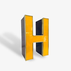 Vintage illuminated letter “H” yellow gold