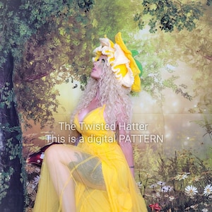 May include: A woman wearing a yellow crocheted daffodil hat with green leaves. The hat is large and has a ruffled edge. The woman is wearing a yellow dress and is standing in a garden setting. The text "The Twisted Hatter This is a digital PATTERN" is visible in the image.