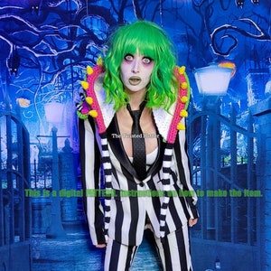 May include: A black and white striped suit with a pink and green crocheted collar and matching scarf. The suit is worn by a person with green hair and white makeup. The background is a blue and black Halloween themed backdrop with jack-o-lanterns.